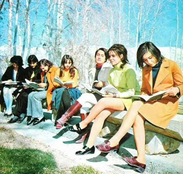 Iranian female students dressed in European style reading books