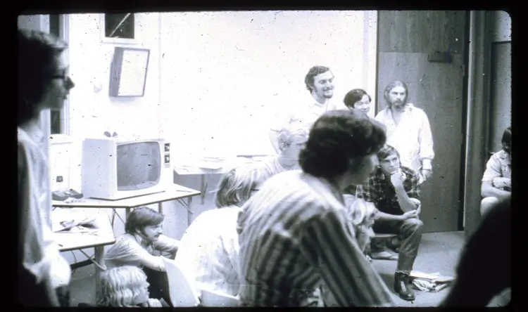 Leaders of the Stanford experiment meeting with participants.