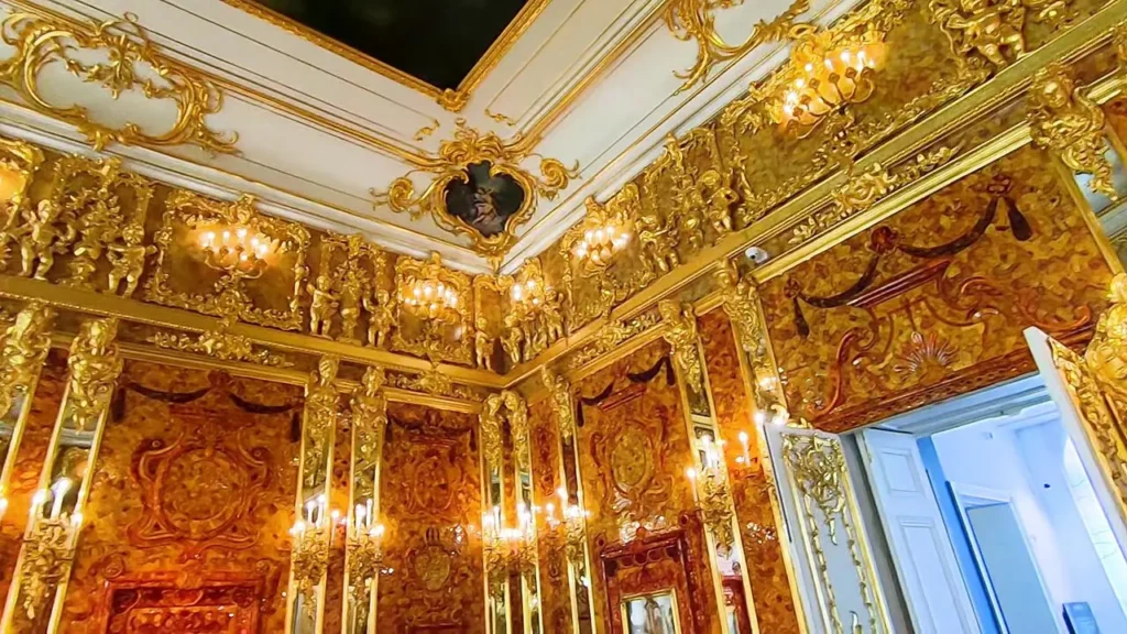 The Amber Room in the Catherine Palace, golden amber panels and gilded decorations