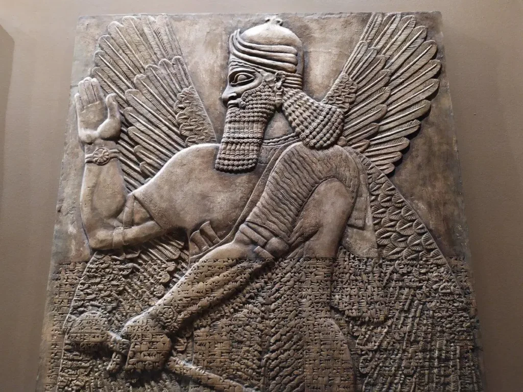 Ancient Mesopotamian deity depicted on a stone relief