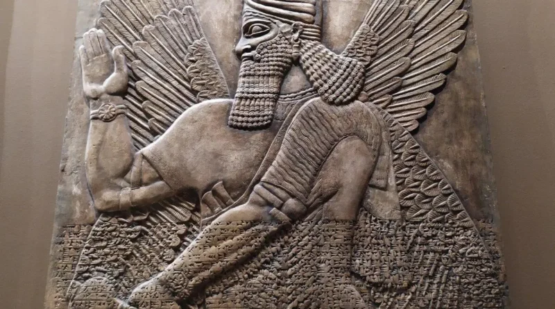Ancient Mesopotamian deity depicted on a stone relief